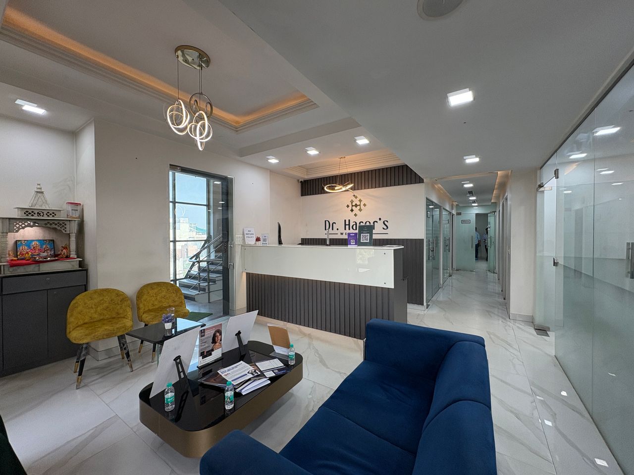 The reception and waiting lounge at Sharma Dental Care